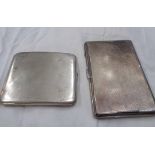 Two silver cigarette cases comprising one with engine turned decoration and internal initials, the