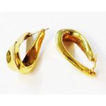 A pair of marked 750 yellow metal loop earrings