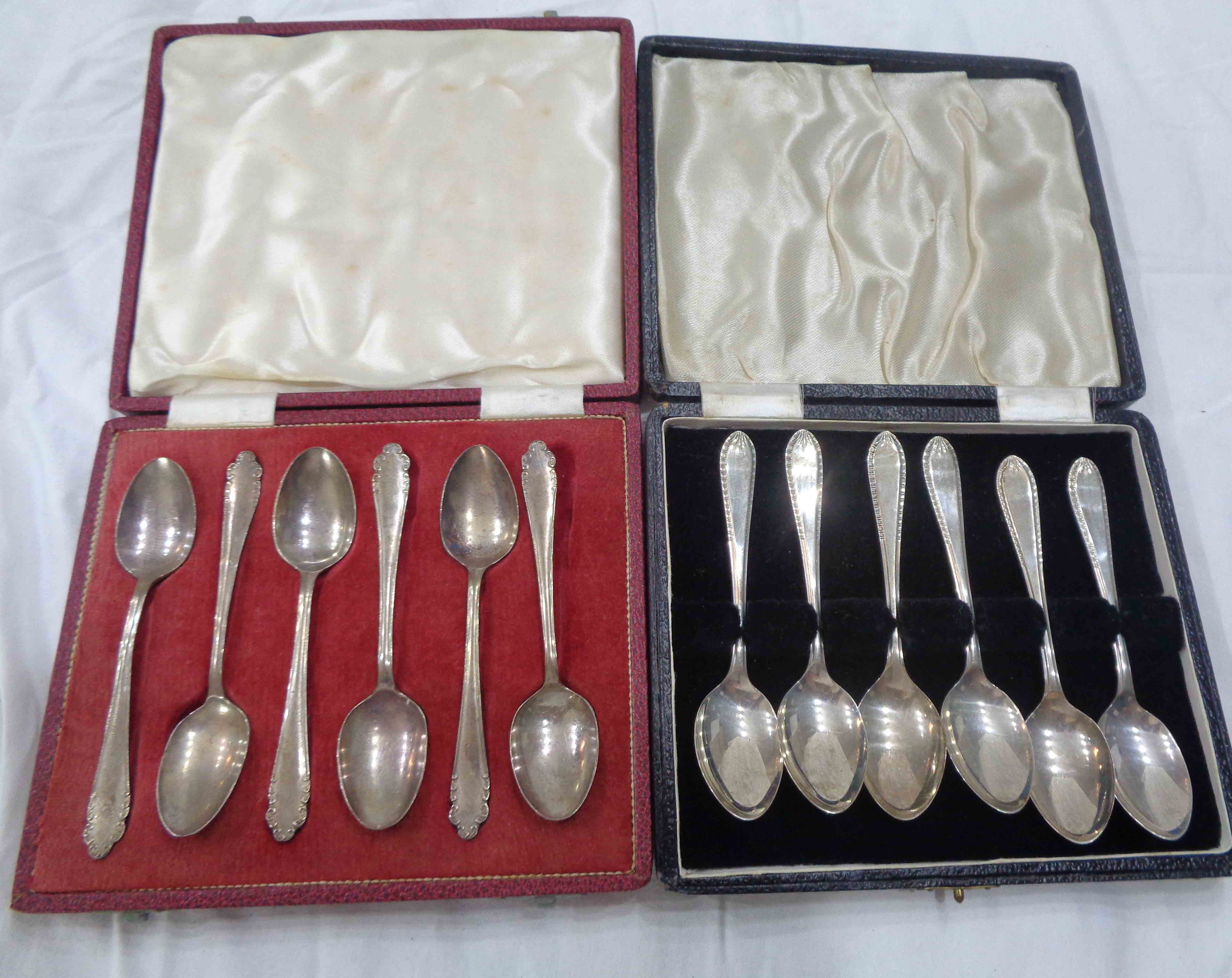 Two cased sets of six each 20th Century silver teaspoons in two styles