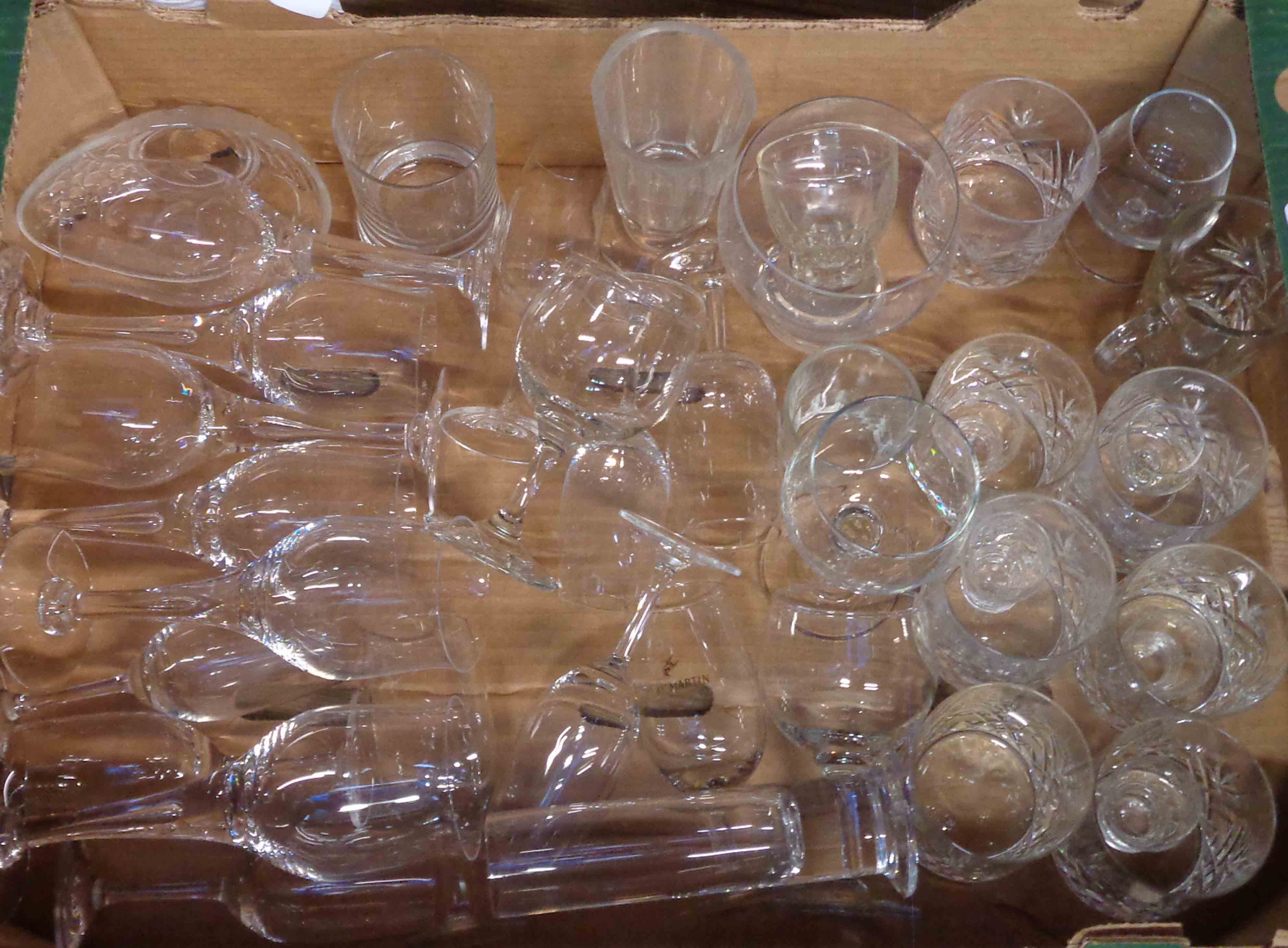 A box containing a quantity of glassware