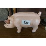 A modern cast iron pig form moneybox