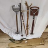 Two vintage shooting sticks and two walking sticks - sold with a gun cleaning rod and a canvas gun