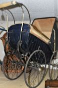 AN ANTIQUE CHILDRENS DOLLS PRAM, together with a small wicker chair, Condition Report: pram in