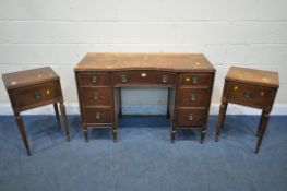A 20TH CENTURY MAHOGANY DESK, fitted with seven drawers, on cylindrical tapered legs, width 119cm