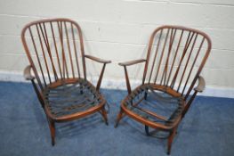 A PAIR OF DARK ERCOL SPINDLE BACK ARMCHAIRS, with open armrests, turned supports, legs and