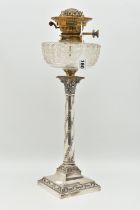 AN EDWARD VII SILVER OIL LAMP, Corinthian column, on a raised square base with floral garland