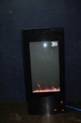 A FOCALPOINT EF11-16 MODERN GLASS FIRE EFFECT HEATER with 'crystal coals', colour change lighting,