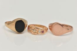 THREE RINGS, to include a 9ct rose gold oval polished signet ring, hallmarked 9ct Chester 1927,