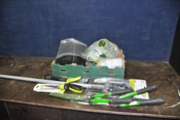 A TRAY CONTAINING GARDENING TOOLS including a Wilko tree pruner, Topiary shears, grass shears,