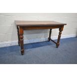 AN EDWARDIAN MAHOGANY SIDE TABLE, on turned legs, united by stretchers, width 123cm x depth 58cm x