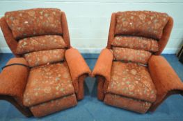 A PAIR OF WILLOWBROOK RED FLORAL UPHOLSTERED RISE AND RECLINE ARMCHAIRS, vibrating function (