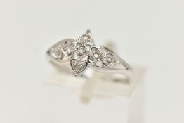 A 9CT WHITE GOLD DIAMOND RING, floral open work design, set with single cut diamonds, open work