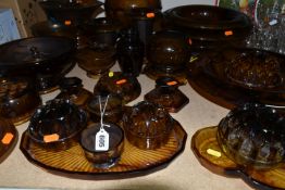 A QUANTITY OF AMBER CLOUD GLASS WARES, approximately thirty items to include vases, bowls with and