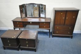 A STAG MINSTREL FOUR PIECE BEDROOM SUITE, comprising a dressing table, with a triple mirror and five