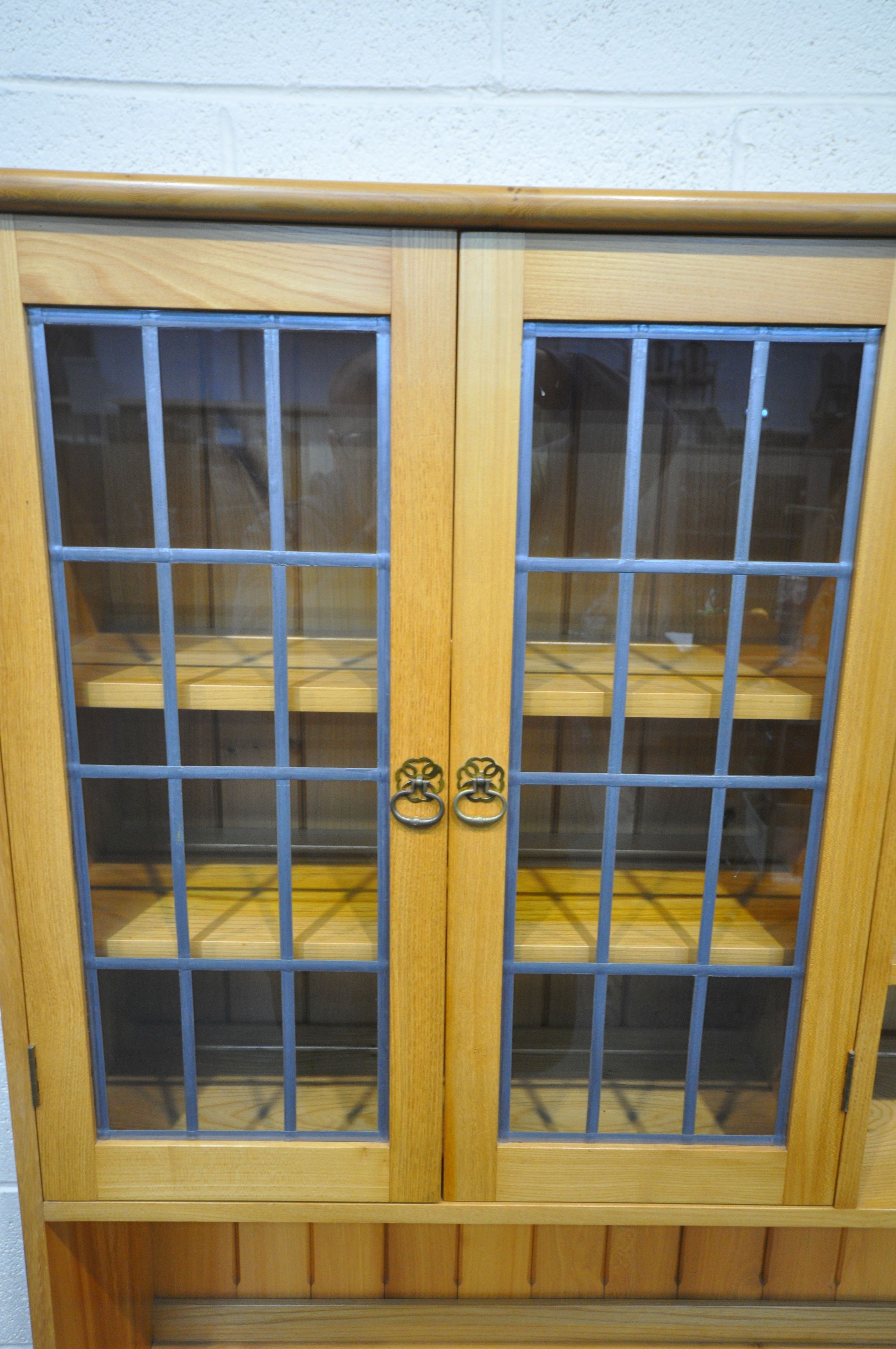 A MODERN QUALITY ASH DRESSER, fitted with an arrangement of shelving, two lead glazed doors and four - Image 2 of 6