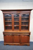A 19TH CENTURY MAHOGANY BOOKCASE, with double glazed doors flanking a central glazed panel,