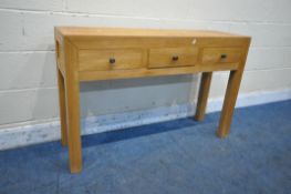 A MODERN OAK SIDE TABLE, with three drawers, width 120cm x depth 37cm x height 78cm (condition