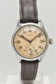 A GENTS MILITARY 'MOERIS' WRISTWATCH, manual wind, round discolored silver dial signed 'Moeris',