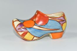 A CLARICE CLIFF SMALL SABOT/CLOG, in Pebbles pattern, painted with colourful geometric design,