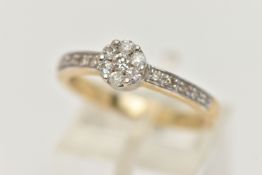 A 9CT GOLD DIAMOND CLUSTER RING, small round cluster set with seven round brilliant cut diamonds, in