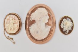 A COLLECTION OF THREE CAMEO BROOCH, to include a floral cameo, in high relief, stamped 750,