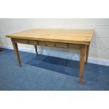 A LATE 20TH CENTURY PINE FARMHOUSE STYLE TABLE, with two frieze drawers, on square tapered legs,