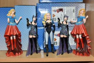 FIVE BOXED ENESCO D.C. 'COUTURE DE FORCE' FIGURES, comprising two Catwoman 6006320 figures, one