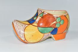 A CLARICE CLIFF SABOT/CLOG, in Melon pattern painted with an abstract fruit design, with 'hand