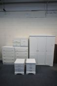 A SELECTION OF MODERN WHITE BEDROOM FURNITURE, to include a triple door wardrobe, width 143cm x