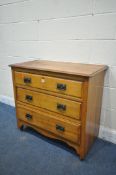 AN EARLY 20TH CENTURY WALNUT CHEST OF THREE LONG DRAWERS, with a wavy apron, on ceramic castors,