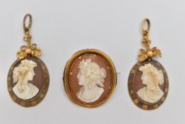 A PAIR OF 19TH CENTURY CAMEO EARRINGS AND A BROOCH, the earrings set with carved shell cameos,