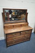 AN EDWARDIAN MAHOGANY DRESSING CHEST, with a single rectangular bevelled edge mirror and three