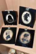 FOUR FRAMED PAINTED SILHOUETTES, comprising three female portraits painted on paper, and one male