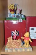 TWO BOXED ENESCO DISNEY TRADITIONS FIGURES, designed by Jim Shore, comprising Winnie The Pooh '