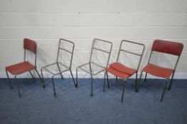 A SET OF SIX INDUSTRIAL TUBULAR METAL STACKING CHAIRS, with red leatherette upholstery, labelled