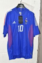 A FRANCE REPLICA HOME FOOTBALL SHIRT SIGNED BY ZINEDINE ZIDANE, signed to the white figure 1 of