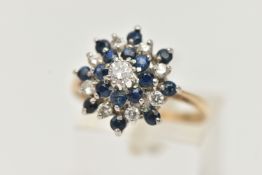 A 9CT SAPPHIRE AND DIAMOND CLUSTER RING, tiered cluster, set with a central round brilliant cut