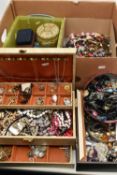 A LARGE ASSORTMENT OF COSTUME JEWELLERY, to include a multi storage jewellery box, tins and boxes of