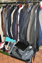 A LARGE QUANTITY OF GENTLEMEN'S CLOTHING AND ACCESSORIES, to include eight suits, rain jackets,