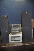 A VINTAGE ROTEL RCX-820L HI FI with a RP-820 turntable, a pair of Rotel speakers and a pair of