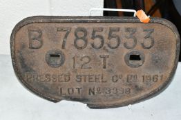 A CAST IRON WAGON PLATE 'No.B785533 12T Pressed Steel Co. Ltd. 1961 Lot No.3398' in ex wagon