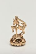 A 9CT GOLD FOB SEAL, in the form of horse jumping a gate, hallmarked 9ct London, on a round base set
