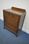 A 20TH CENTURY OAK CHEST OF FOUR DRAWERS, with a raised back, on shaped front legs, width 75cm x