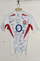 A SIGNED REPLICA ENGLAND MEN'S RUGBY WORLD CUP 2003 SHIRT, multiple signatures in black felt pen