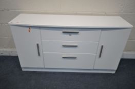 A GLOSSY WHITE SIDEBOARD, fitted with two cupboard doors and three drawers, length 147cm x depth