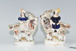 A NINETEENTH CENTURY NEAR PAIR OF SMALL STAFFORDSHIRE FIGURES, each in the form of a child seated on