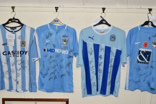 FOUR SIGNED COVENTRY CITY REPLICA HOME FOOTBALL SHIRTS, all date from the 21st Century and are