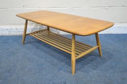 A MID CENTURY ERCOL ELM AND BEECH COFFEE TABLE, on turned legs and undershelf, length 106cm x