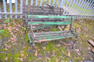 TWO MODERN WOODEN SLATTED GARDEN BENCHES with cast iron scrolled ends BOTH 122cm long, a modern