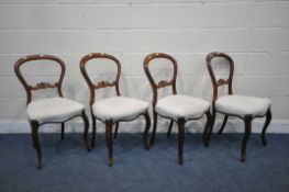 A SET OF FOUR VICTORIAN MAHOGANY BALLOON BACK CHAIRS, with beige studded upholstery, on front